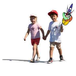 two kids walking hand in hand