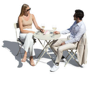 cut out man and woman sitting in a cafe seen from above