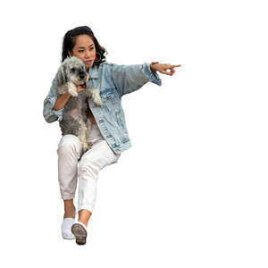 cut out woman with a dog sitting and pointing at smth
