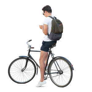 cut out young man stopping while riding a bike and texting