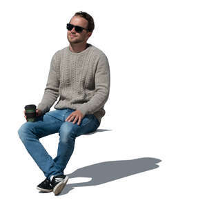 cut out man sitting in the sun and drinking coffee
