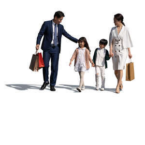 cut out asian family with two kids and shoppping bags walking