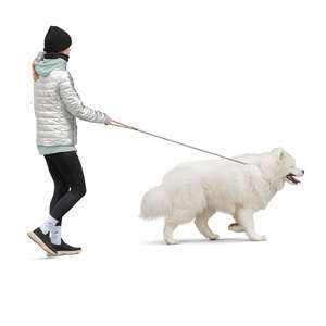cut out woman walking a big white fluffy dog