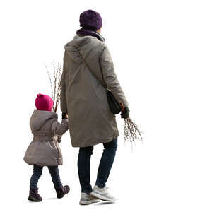 cut out mother and daughter walking hand in hand holding easter pussy willow branches 