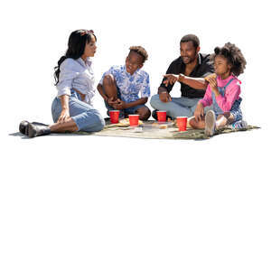 cut out black family with two kids having a fun picinc