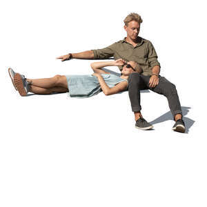 cut out couple sitting and relaxing outside 