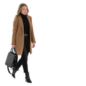cut out woman in a brown overcoat walking