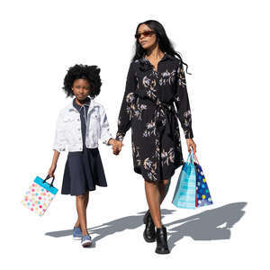 cut out mother and daughter with shopping bags walking hand in hand