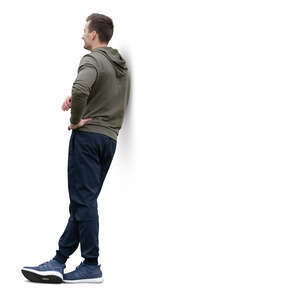 cut out man standing and leaning against a wall