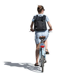 cut out woman in a blue summer dress riding a bike