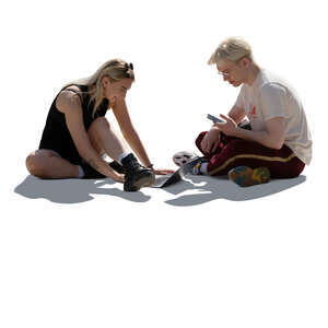 cut out man and woman sitting on the ground and looking at laptop