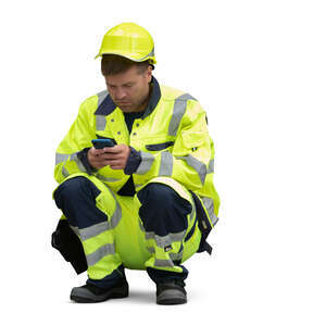 cut out worker on a break squatting and texting