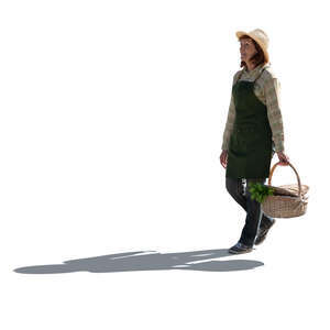 cut out older woman working in the garden carrying a basket