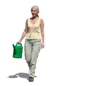 cut out elderly lady with a watering can walking