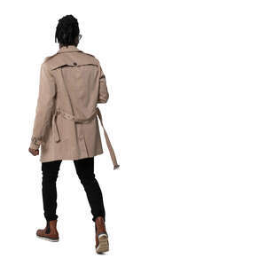 cut out man in a brown trenchcoat walking