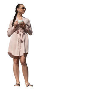 cut out woman standing on a balcony and drinking coffee