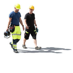 two cut out sidelit workers walking and talking