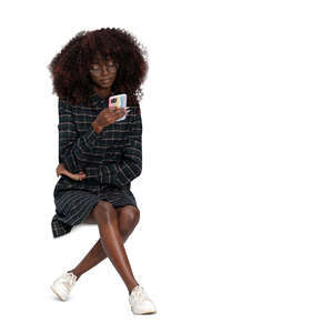 cut out woman sitting and checking her phone