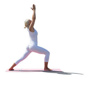 cut out backlit woman doing yoga