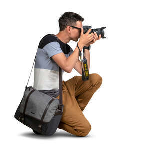 cut out man squatting and taking pictures