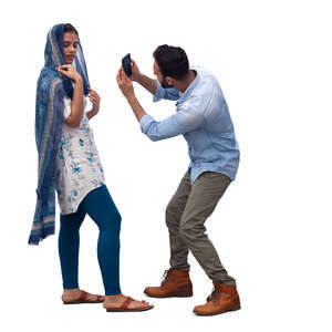 cut out man taking a picture of a woman