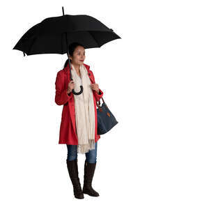 cut out woman with an overcoat and an umbrella standing