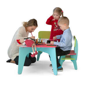 two cut out kids and a woman drawing at a kids table