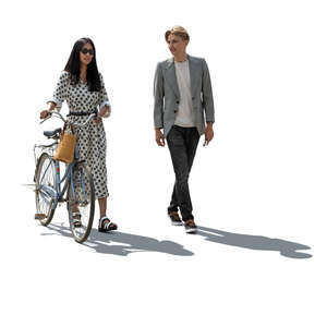 cut out backlit man and a woman with a bike walking and talking