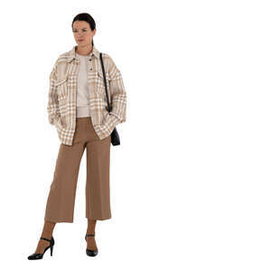 cut out woman in a chic beige outfit standing