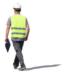 worker with helmet walking in sulight