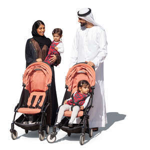 emiarati family with twin girls walking
