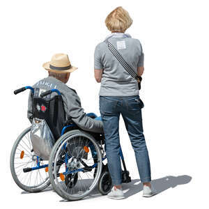 elderly couple with a man in a wheel chair