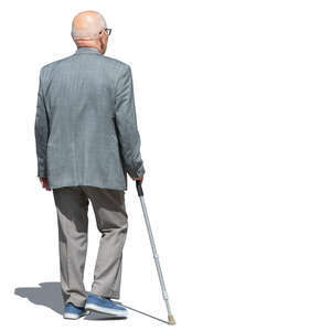 old man in a grey suit walking