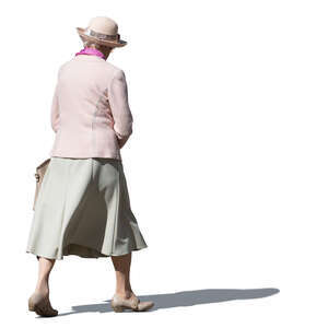 elderly woman with a hat walking