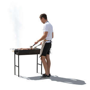 cut out man cooking meat at a barbeque stove