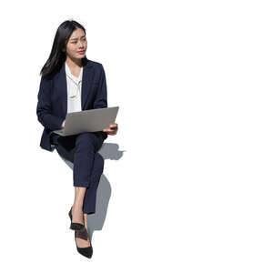 cut out asian businesswoman with a laptop sitting