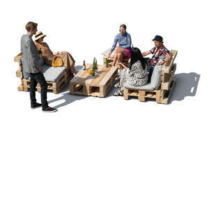 cut out group of young people hanging in a bohemian outdoor cafe