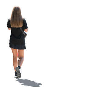 cut out backlit woman in a black mini dress walking