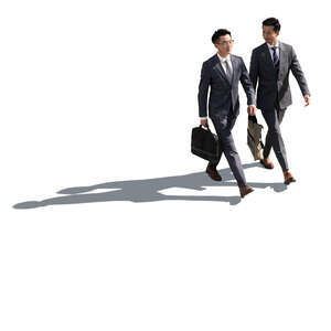 two cut out sidelit buinessmen walking seen from above