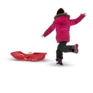 cut out girl with a sledge gaving fun in the snow