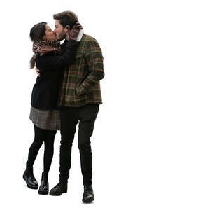cut out couple kissing outside in autumn