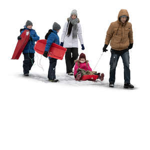 cut out family in winter going sledging