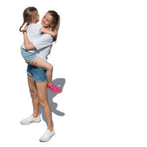 cut out mother holding her daughter seen from above