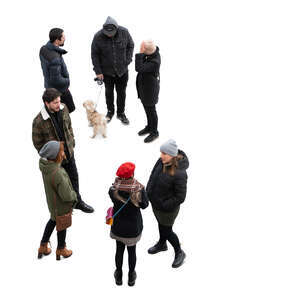 two cut out groups of people standing seen from above