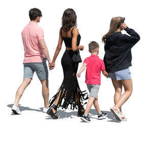 cut out family of four walking in the sunlight