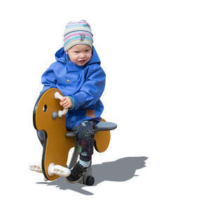 cut out little boy playing on the outdoor playground