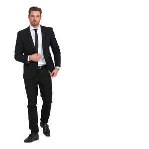 cut out man in a black suit walking