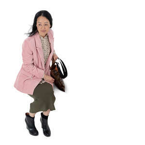 cut out asian woman sitting seen from above