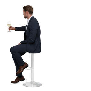 cut out man sitting at a bar and drinking wine