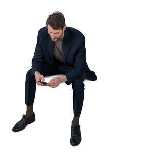 cut out man in a suit standing seen from above